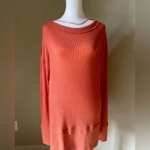 Free people orange blouse.